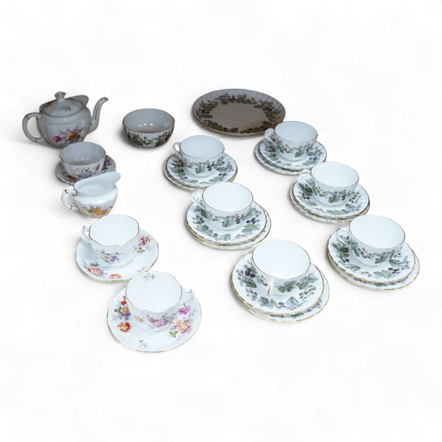 A Royal Crown Derby tea for two set, and a Royal Worcester Lavinia pattern part tea set to include trios, largest 20cm wide